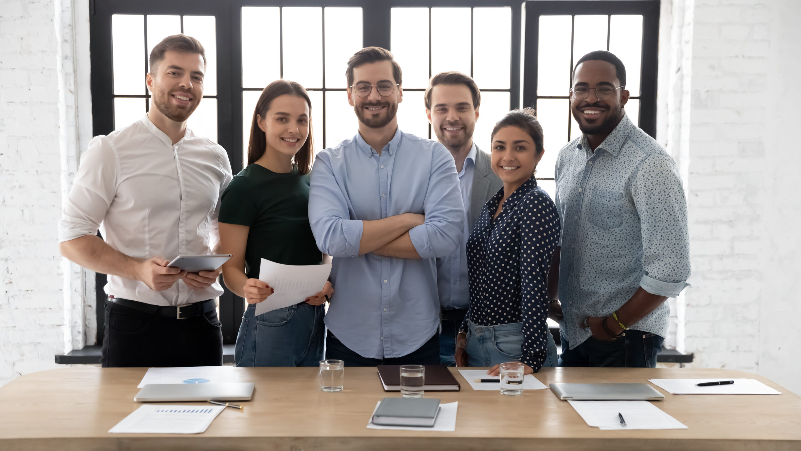 Corporate photo smiling diverse employees